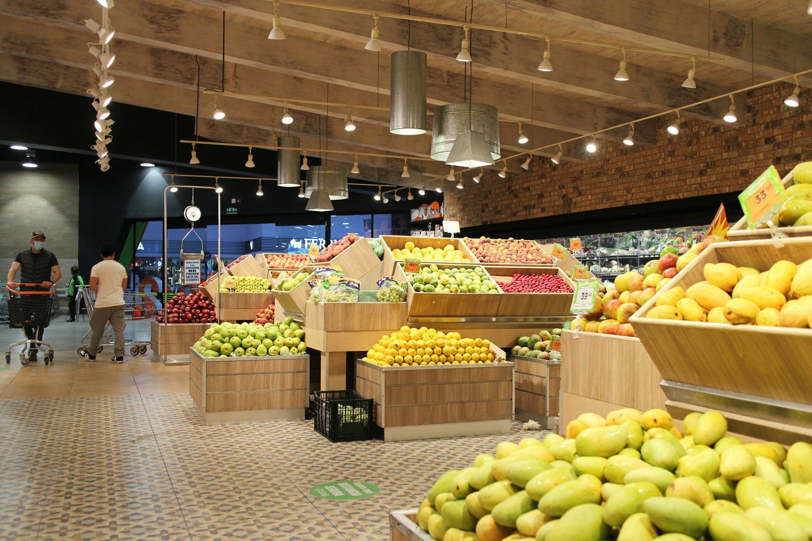 Fresh produce stands inside a grocery store